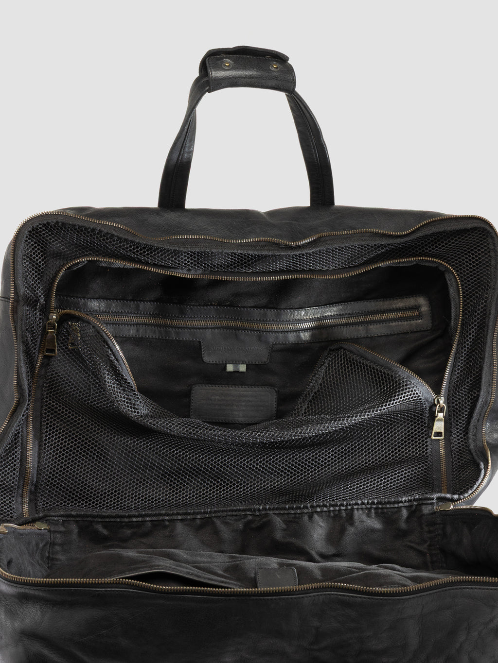 HELMET 056 - Schwarze Reisetasche aus Leder - image 7,side view