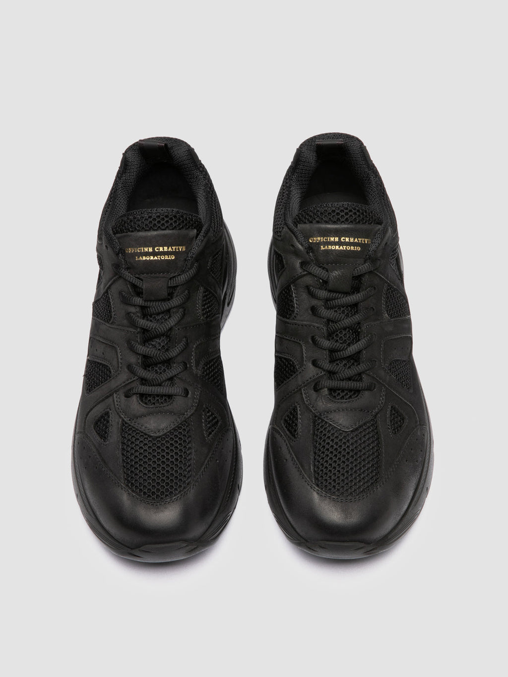 SUPURBIA 001 - Black Leather and Suede Low Top Sneakers - image 2,side view
