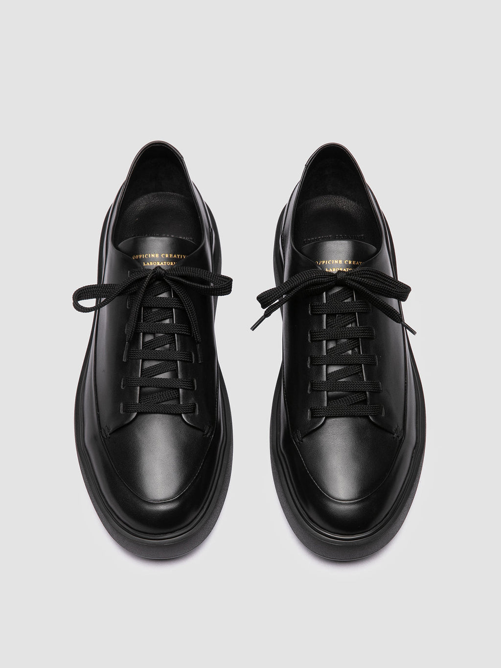 RELEASE 001 - Black Leather Sneakers - image 2,side view